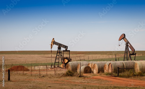 Oil Pumps ( Pumpjacks) and Hay Bales