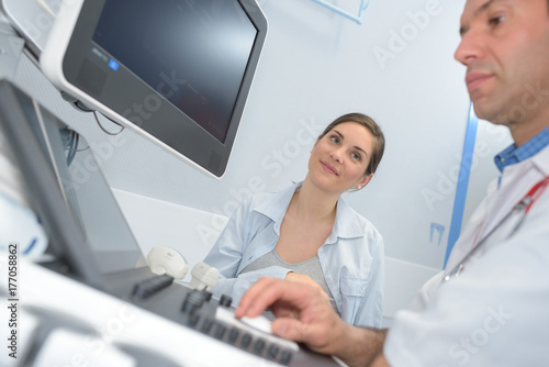 doctor and patient ultrasound equipment diagnostics sonography