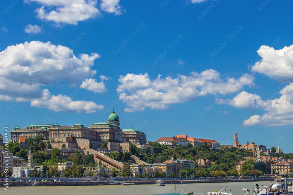 Budapest, Hungary - Skyline view of the famous Buda Castle Royal Palace on Hill on a summer day with blue sky and clouds