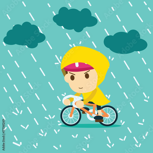 cyclists wearing raincoat cycling bicycle in the rain