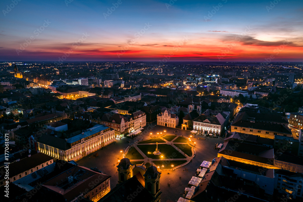Union Square Timisoara - aerial view at blue hour with nice red horizon over the city lights
