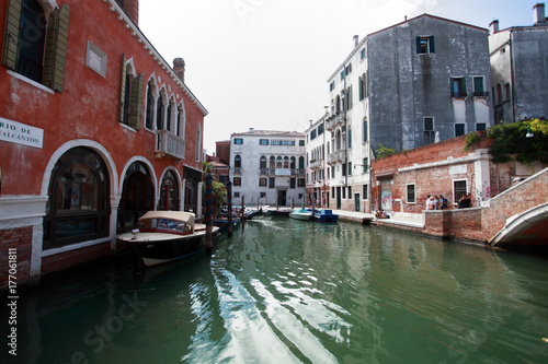 venice, canal with various boats n © diecidodici