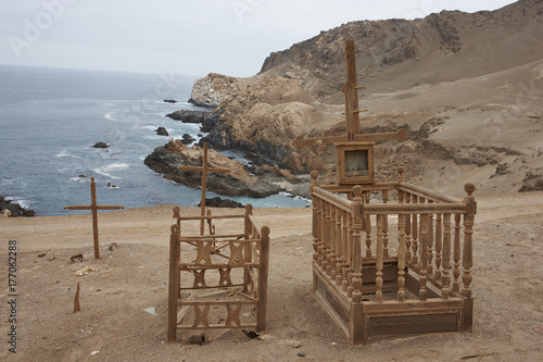 Historic cemetery from the era of nitrate mining in the Atacama Desert, at Pisagua on the coast of northern Chile photo