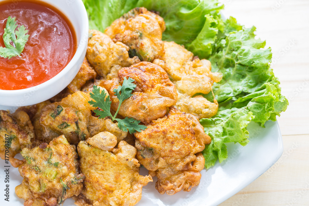 egg steam with fried and saucechilli, lettuce on table egg steam with fried and saucechilli, lettuce on table