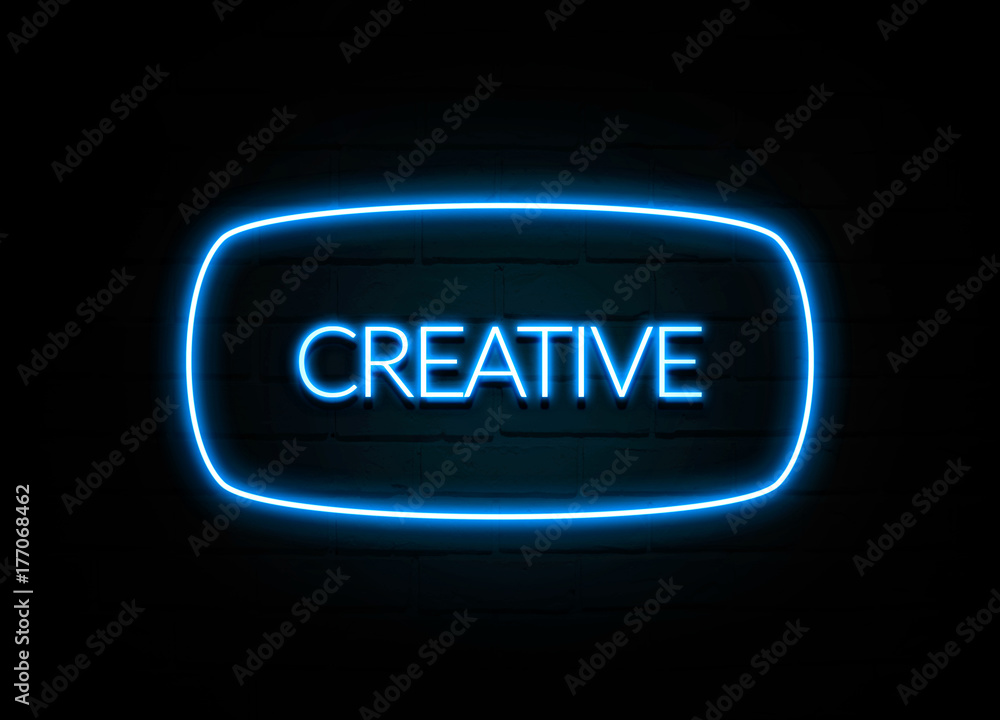 Creative - colorful Neon Sign on brickwall Creative - colorful Neon Sign on brickwall