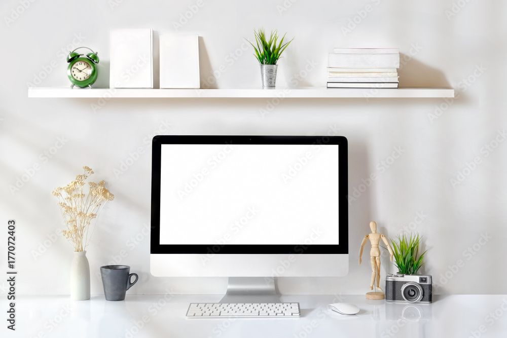 Loft studio concept. Designer work space blank screen desktop computer, vintage toy, houseplant and office supplies. Loft studio concept. Designer work space blank screen desktop computer, vintage toy, houseplant and office supplies.