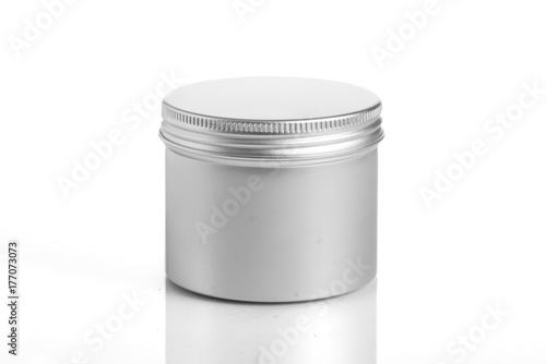 empty aluminum jars cosmetic, lotion packaging on a white background