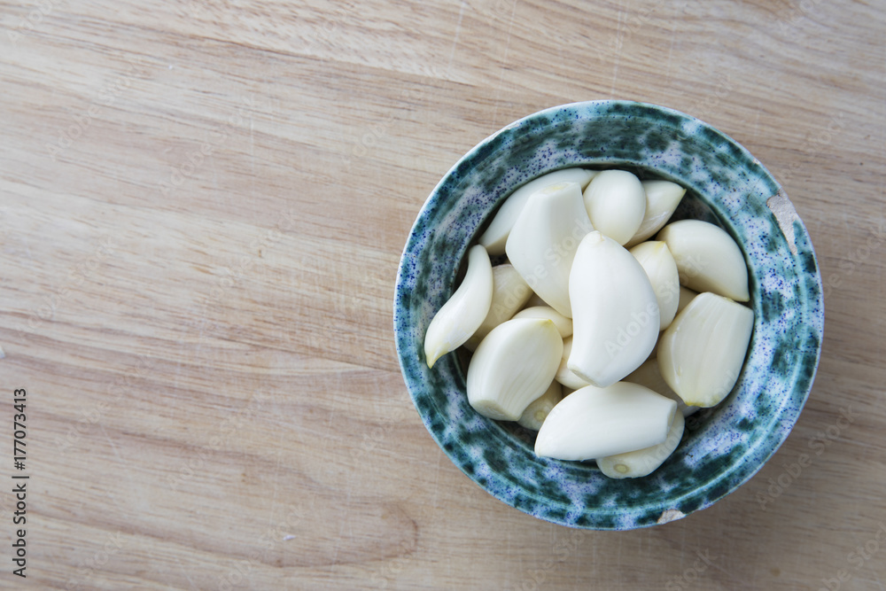 Peeled Garlic Coves in Bowl Peeled Garlic Coves in Bowl
