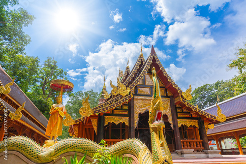 Beautiful Thai Temple with wooden handcraft art decoration in Chiangmai at Wat Ram Poeng (Tapotaram)Temple © Quality Stock Arts