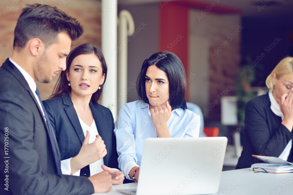 Teamwork process concept.Young coworkers work with new startup project in office.Analyze document, plans. Teamwork process concept.Young coworkers work with new startup project in office.Analyze document, plans.