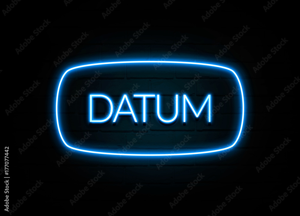 Datum - colorful Neon Sign on brickwall Datum - colorful Neon Sign on brickwall