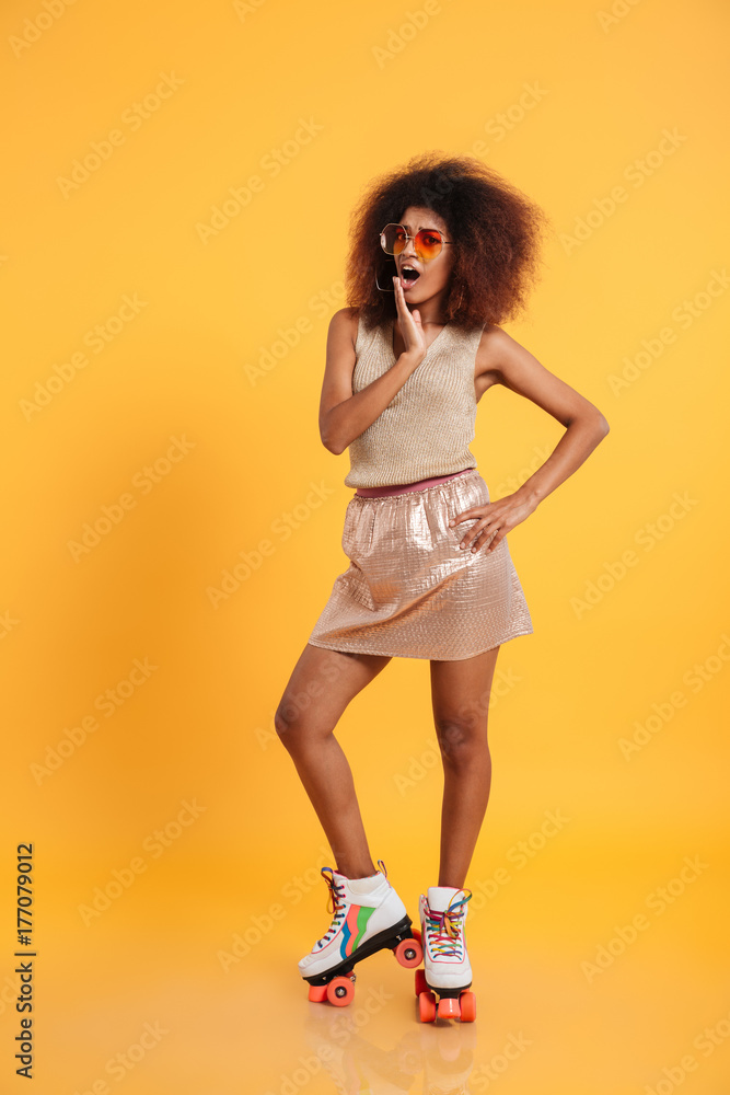 Full length portrait of a shocked afro american woman Full length portrait of a shocked afro american woman