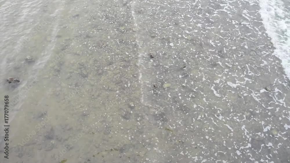 Tropical view of blue sea with rolling  waves. Waves in ocean Splashing.