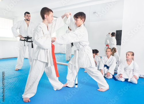 Pair of boys practicing new karate moves