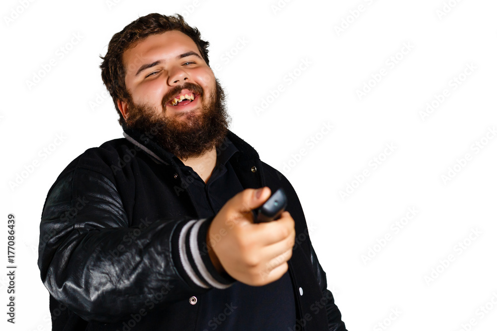 young man holding remote tv control young man holding remote tv control