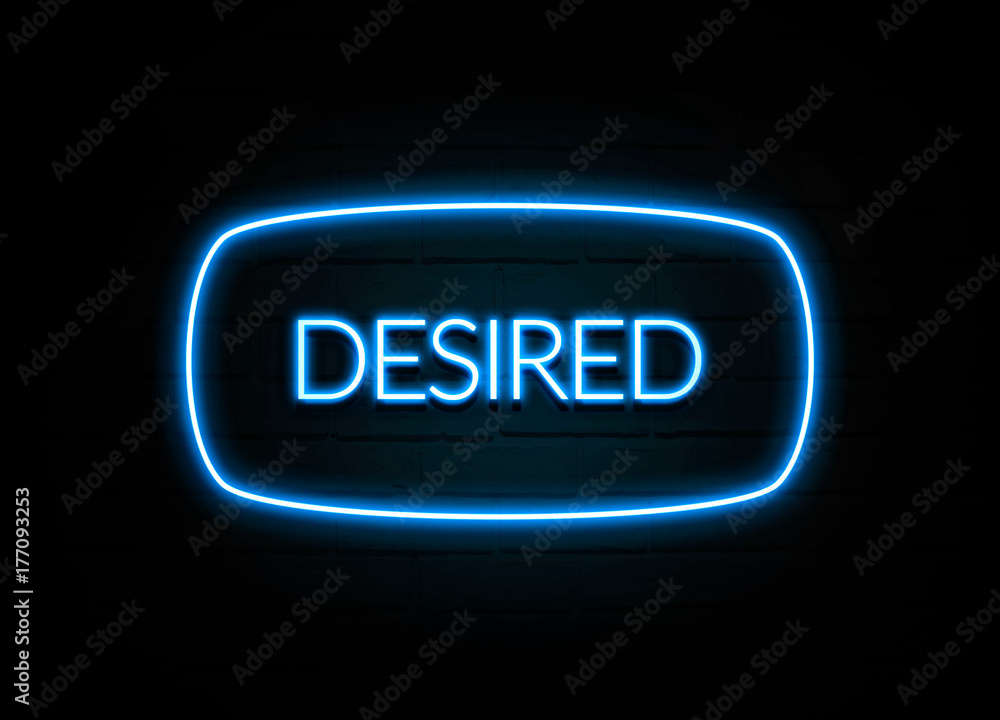 Desired  - colorful Neon Sign on brickwall