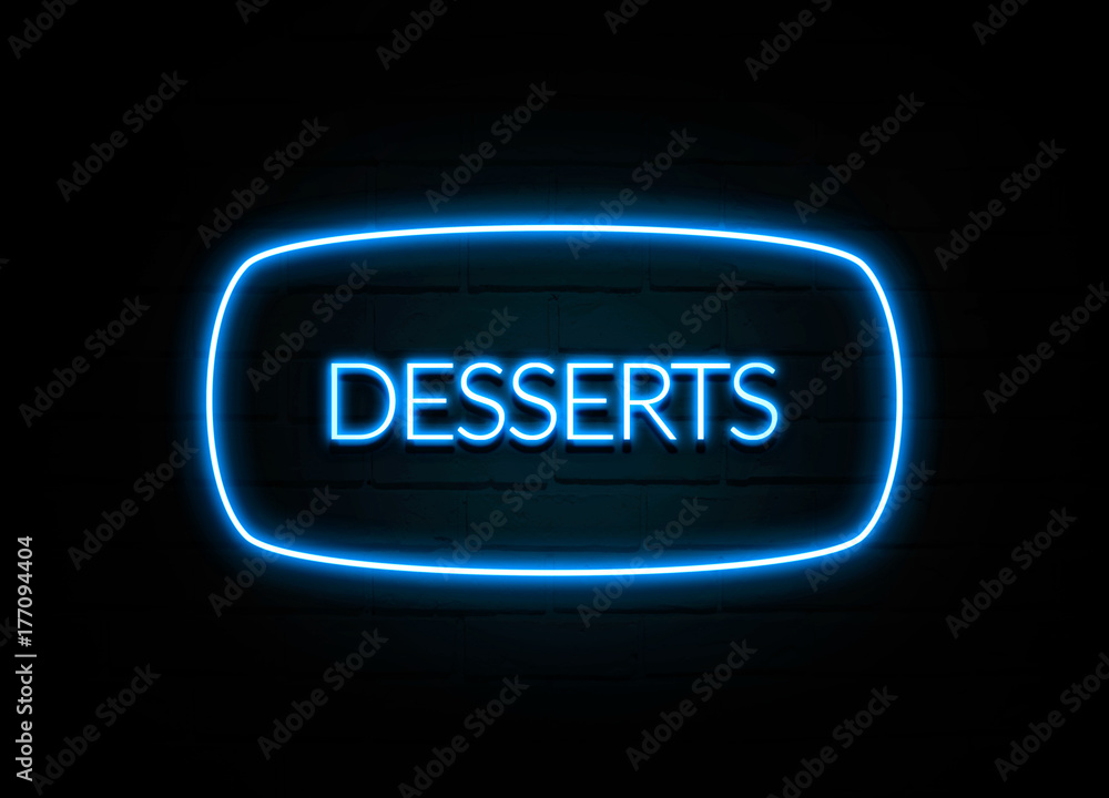 Desserts  - colorful Neon Sign on brickwall