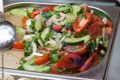 vegetable salad on a counter of street cafe