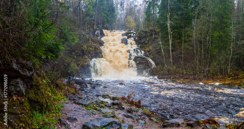 Falls in a summer garden, in the Karelia photo