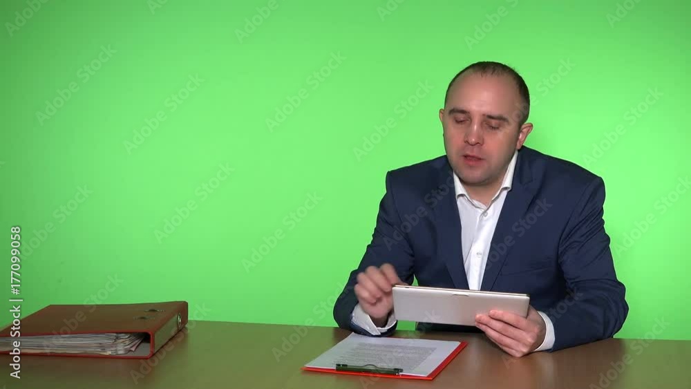 Head business man give orders for workers. Green wall background Head business man give orders for workers. Green wall background