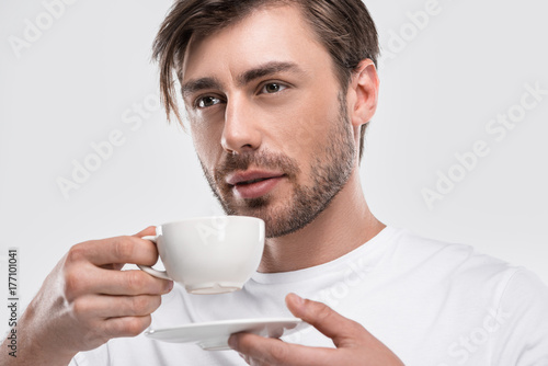 man drinking coffee