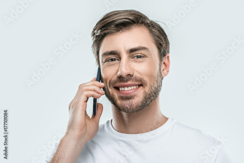 man talking on smartphone