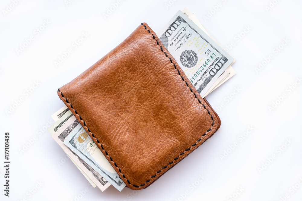 dollars bills in wallet on white dollars bills in wallet on white