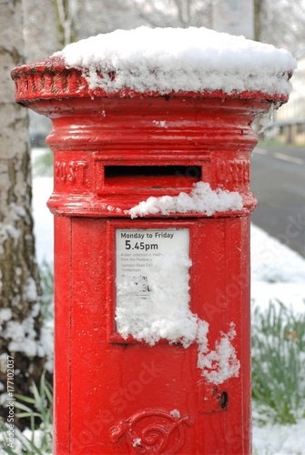 Photography British postbox close up in snow
