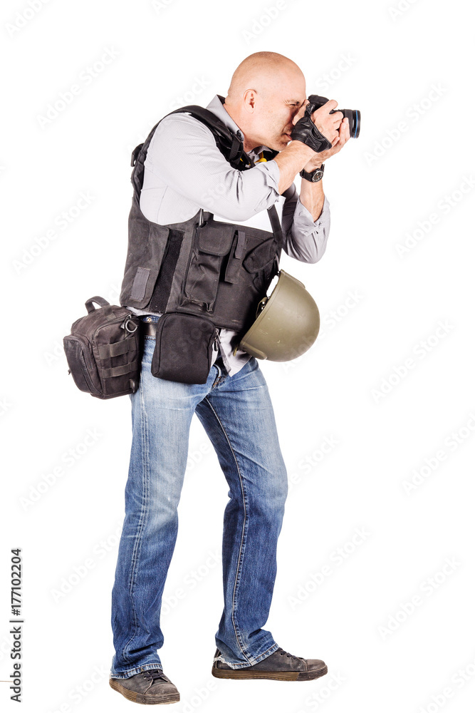 military press photographer with a professional camera. military press photographer with a professional camera.