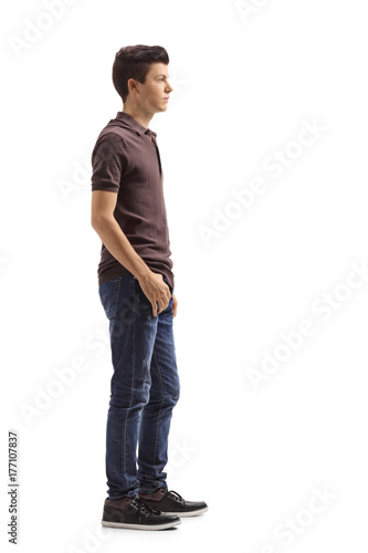 Teenage boy waiting in line