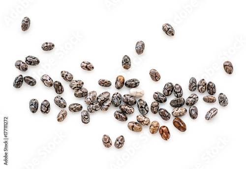 Closeup macro of small organic chia seeds isolated on a white background