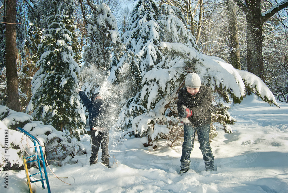 the guys are playing in the snow in the winter the guys are playing in the snow in the winter