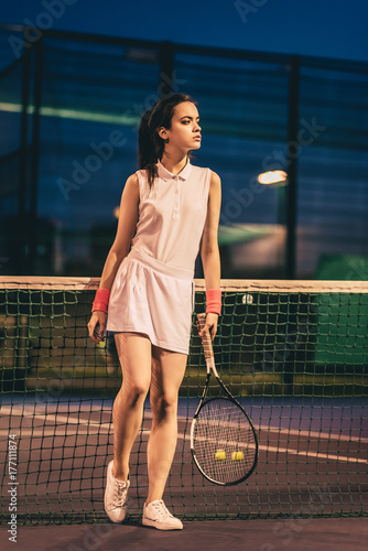 Girl on tennis court © Vasyl