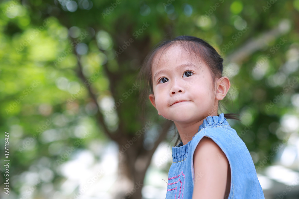 Portrait of little asian girl posing at metal stair. Portrait of little asian girl posing at metal stair.