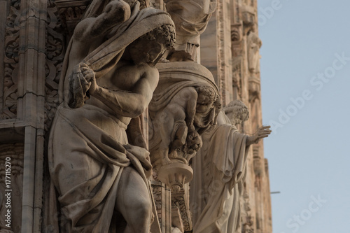 sculptures on the facade of Duomo in Milan