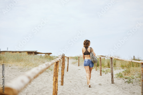 Woman Going to Beach © LStockStudio