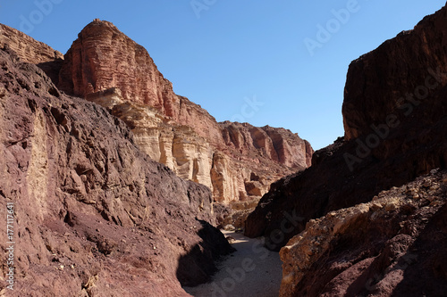 Scenic trail in red sandstone canyon of Eilat Mountains. © leospek