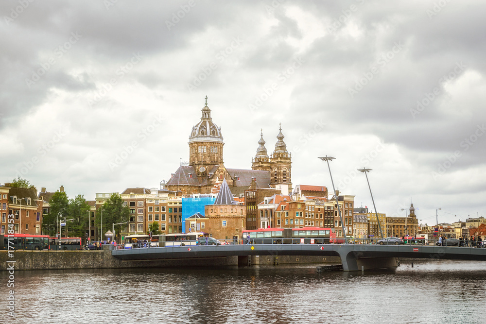 Amsterdam canal and Basilica of St. Nicholas