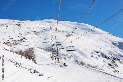 Winter panorama of the mountain with ski slopes. Caucasus. Landscape high peaks in clear weather.