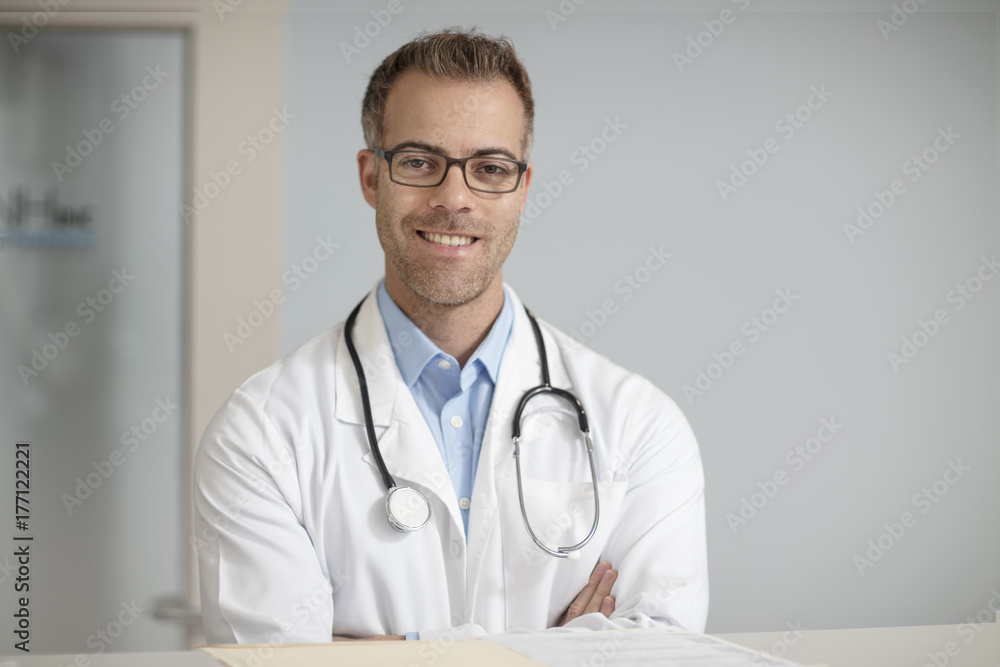 Portrait of smiling doctor in medical practice Portrait of smiling doctor in medical practice
