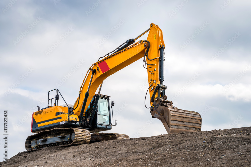 Big excavator in construction site Big excavator in construction site