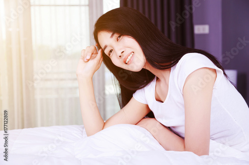 beautiful woman on bed in bedroom © geargodz