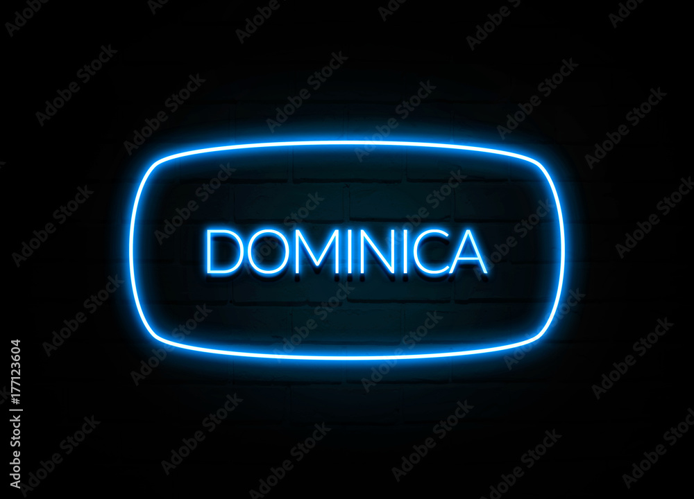Dominica - colorful Neon Sign on brickwall Dominica - colorful Neon Sign on brickwall