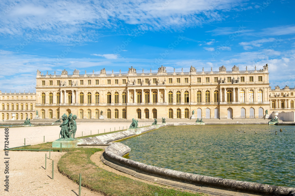 The royal Palace of Versailles near Paris on a beautiful summer day