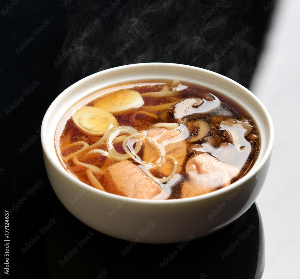 Seafood miso soup with salmon calamary and mashrooms Seafood miso soup with salmon calamary and mashrooms