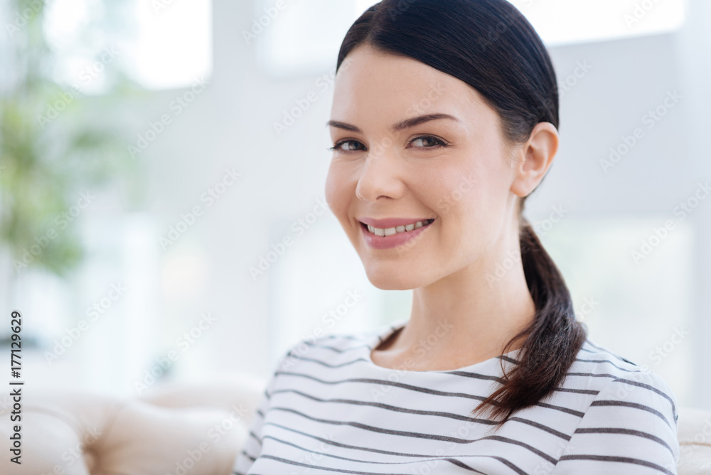 Happy positive woman looking at you