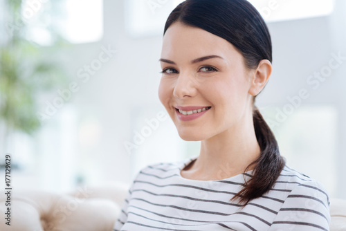 Happy positive woman looking at you