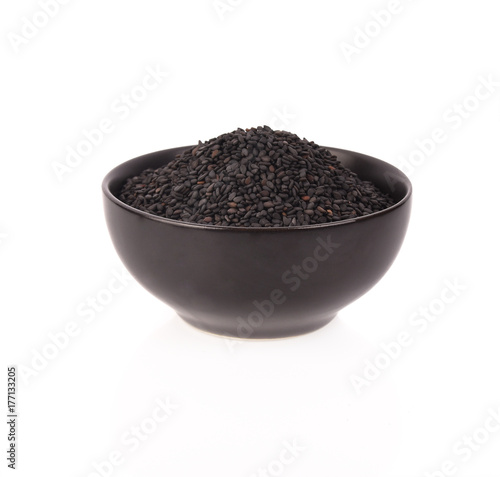 Black Sesame Seeds in bowl on white background