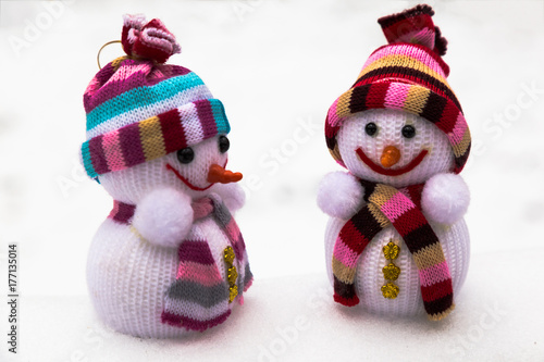 New Year's toys - two snowmen in the snow.