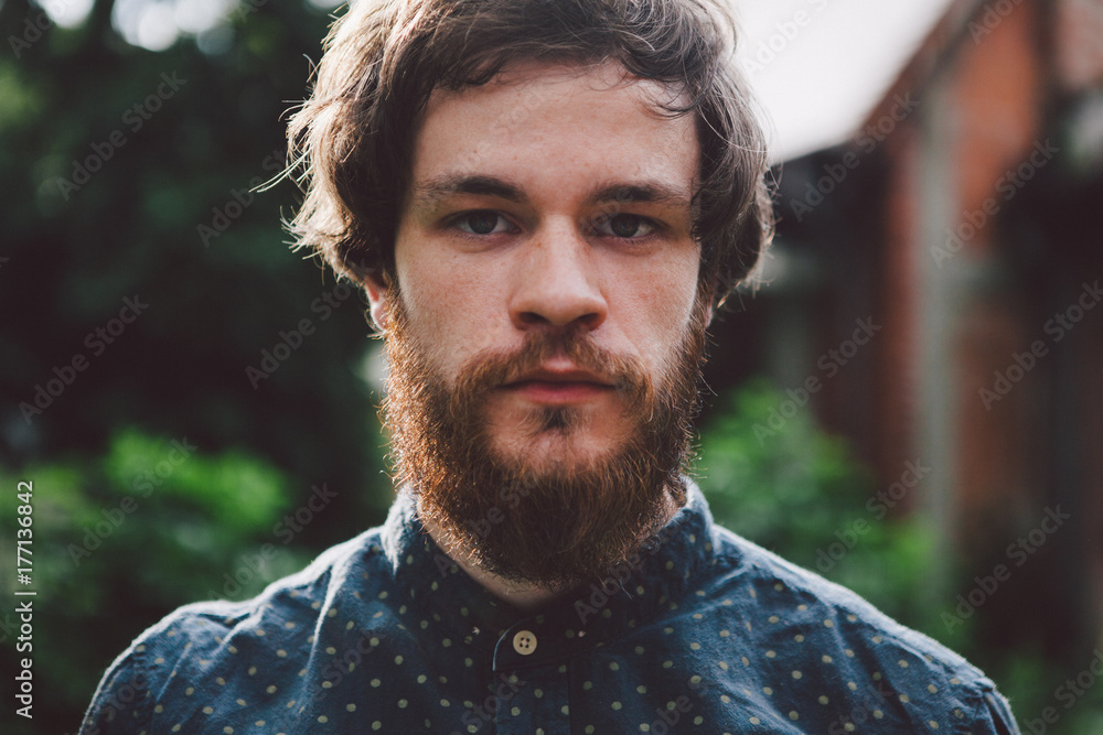 Hipster portrait in the backyard garden